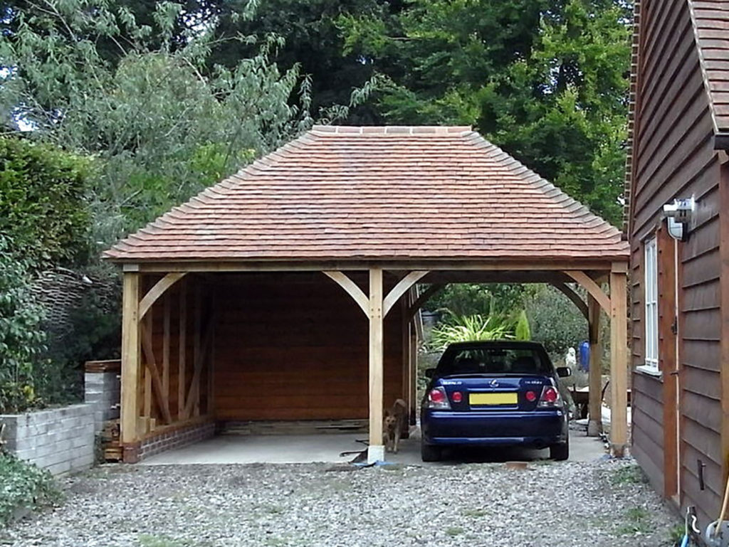 a car in a timber carport